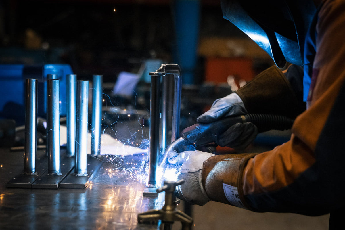 Welding at SELKA's metal furniture factory in Nastola